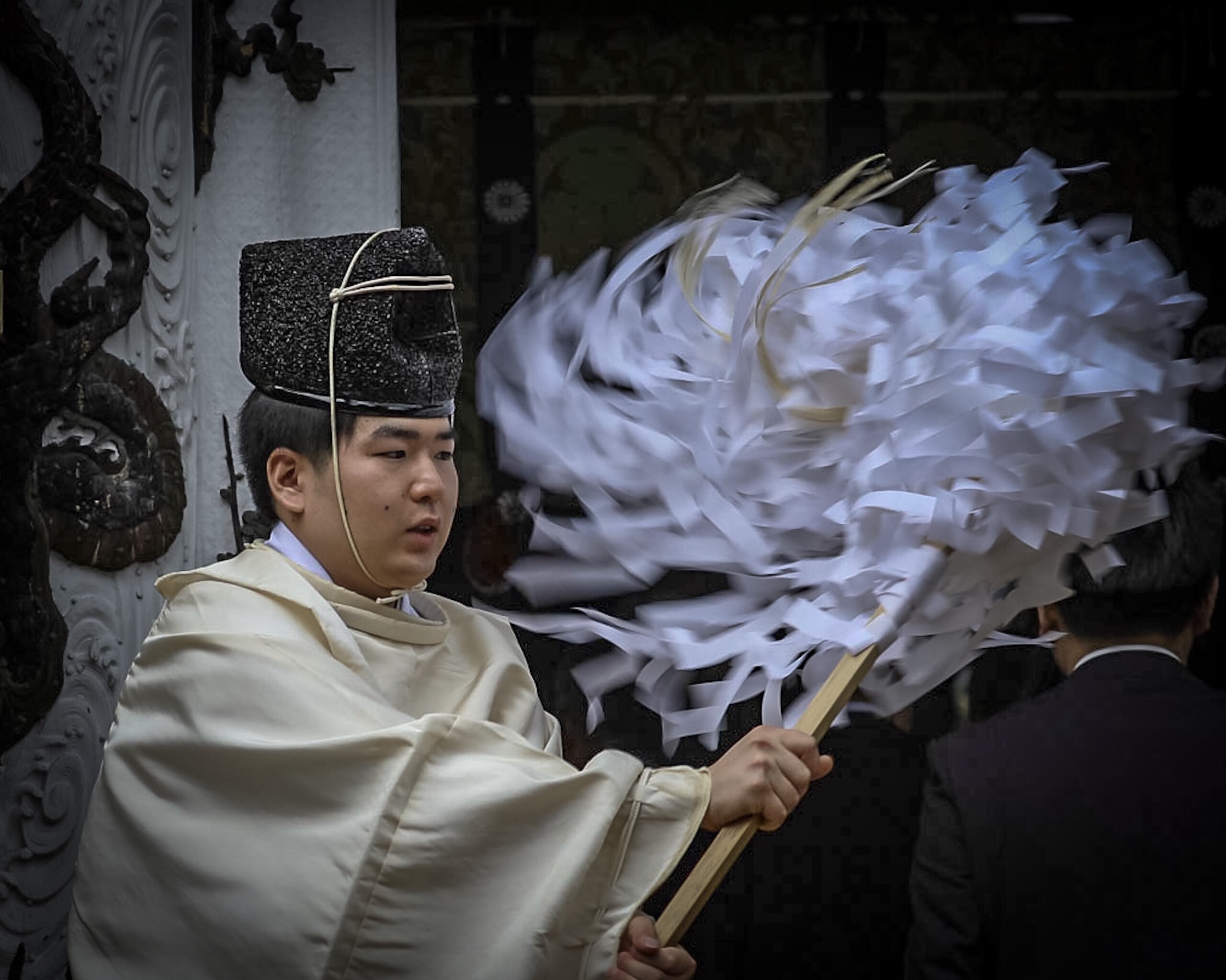 Blessing honored guests at the shrine.